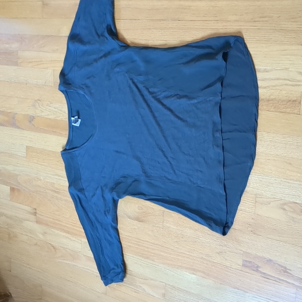 Xcvi top with 3/4 sleeves. High low length.  Size medium.